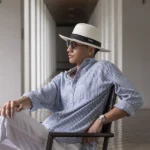 colonial boy sitting-600x900
